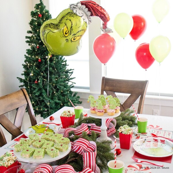 Grinch Balloon and table of green treats