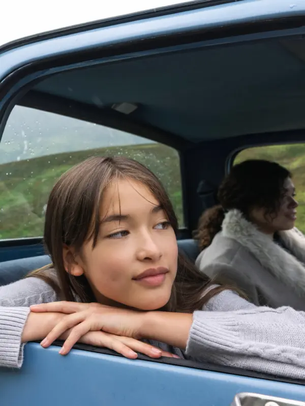 Girl and woman in car