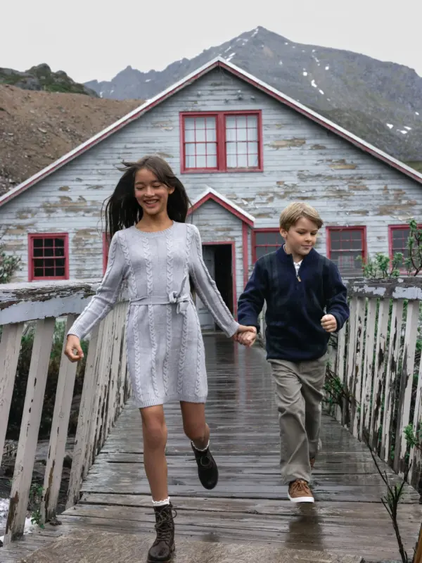 Little girl and boy holding hands